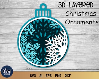 May include: A layered Christmas ornament design in shades of teal, white, and navy blue, featuring snowflake cutouts. The text "3D Layered Christmas Ornaments" is displayed above the ornament. The design includes SVG, AI, EPS, PNG, and DXF file formats.