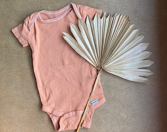 rust colored baby onesie