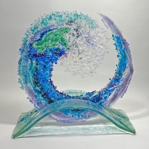 12 inch Turtle Wave on glass arched stand , 12 X 13 X 5 inches