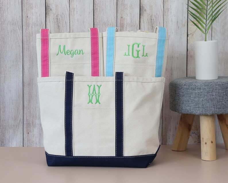 Personalized canvas tote bags shown in multiple color options with custom embroidered names and monograms for women, graduates and bridesmaids.