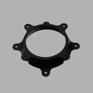 Può includere: Anello in plastica nera con sei punti di montaggio, progettato per l'installazione di altoparlanti.