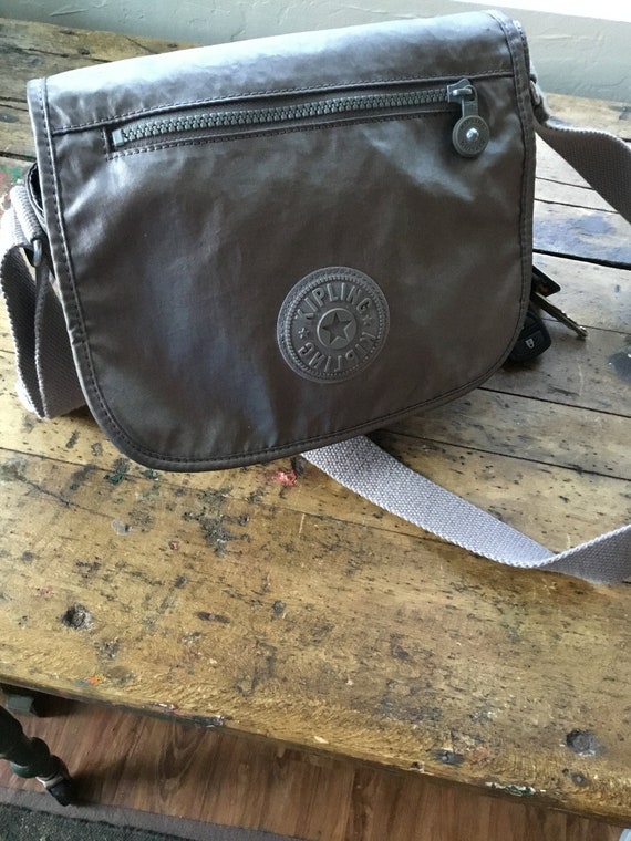 purse with strap across chest