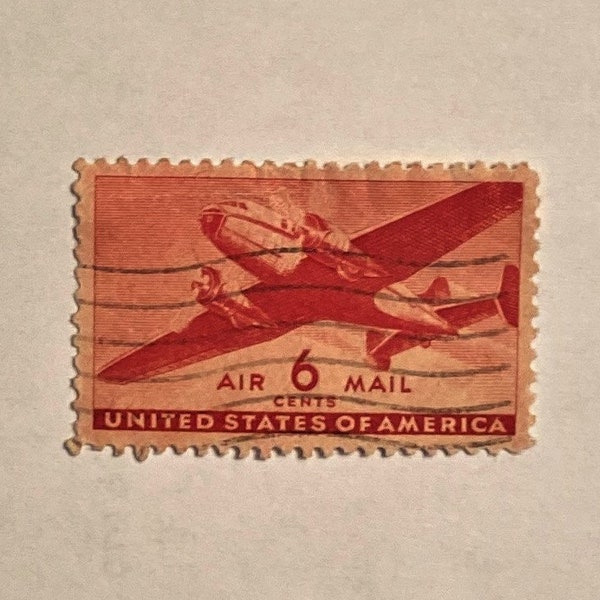 U.S. 6 cent Air Mail Stamp; 1940s circa; Features DC-4 Skymaster; Light Cancelled; VF/NH