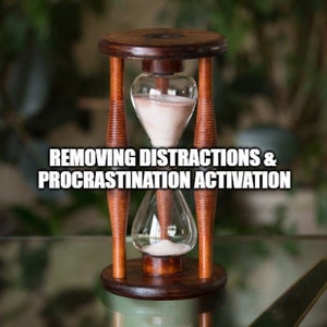 May include: A wooden hourglass with a brown base and a glass bulb filled with white sand. The hourglass is on a reflective surface with the text "REMOVING DISTRACTIONS & PROCRASTINATION ACTIVATION" visible in the background.