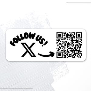 May include: A white rectangular sticker with the text "FOLLOW US!" in a black, playful font. A black "X" is in the center, with an arrow pointing to a QR code. The background is a light gray with a subtle pattern.