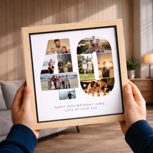 May include: A square wooden frame containing a photo collage arranged in the shape of the number 40. The collage features various family photos. Below the number, the text reads: HAPPY 40TH BIRTHDAY JAMIE LOTS OF LOVE XXX. The frame is light wood.
