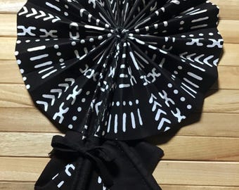 West African mudcloth inspired print; black and white hand fan; matching case