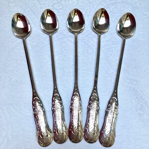 ensemble vintage de cuillères à thé, de cuillères à café et de cuillères à dessert hollandaises en argent, avec un joli motif réalisé par Pako Rhenen.