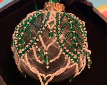 Lovely handmade beaded ornament with glass ornament underneath. Green glass beads. Vintage