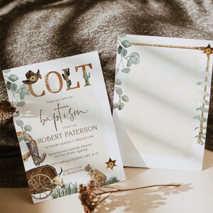 May include: A baptism invitation with a western theme. The invitation features a cowboy hat, boots, and a wagon wheel. The text on the invitation reads "COLT" and "baptism of our son ROBERT PATERSON".
