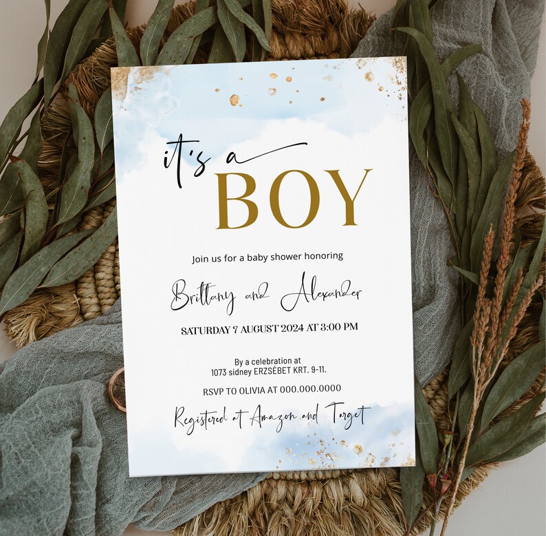 May include: A baby shower invitation with a blue and gold watercolour background. The invitation includes the text "It's a Boy", "Join us for a baby shower honouring Brittany and Alexander", "Saturday 7 August 2024 at 3:00 PM", "By a celebration at 1073 sidney ERZS&Eacute;BET KRT. 9-11", "RSVP to Olivia at 000.000.0000", and "Registered at Amazon and Target".