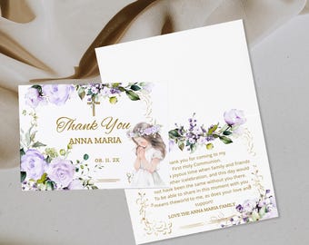 May include: A set of First Holy Communion thank you cards. The cards feature a floral design with lavender and white flowers, a gold cross, and the text "Thank You Anna Maria". The card also includes a drawing of a girl in a white dress.