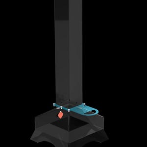 May include: A clear acrylic dispenser with a blue handle and a red accent. The dispenser is designed to hold items like paper towels or napkins.