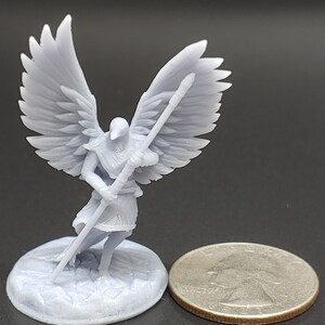May include: A light grey miniature angel figurine with large, detailed wings, holding a staff. The angel stands on a textured base, next to a coin for size comparison. The figurine is likely 3D-printed and suitable for tabletop gaming.