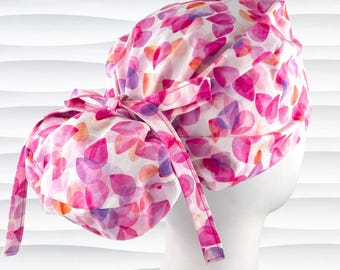 Pink Floral Euro Pony Scrub Cap | Petals on White | Hybrid Ponytail | Nurse Ponytail Hat | Optional Satin Lined and Buttons | "Pink Passion"