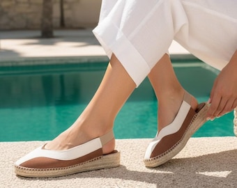 Espadrillas in pelle con tacco basso a zeppa