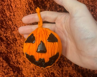 Jack-o’-lantern hanging ball  Or for keychain.
