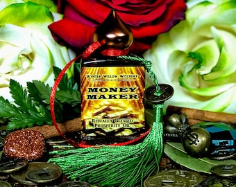 May include: A small bottle of amber-colored oil with a red and green tassel. The bottle label reads "Money Maker" and "Ritually Blessed Prosperity Oil". The bottle is surrounded by green leaves, red and white roses, and gold coins.