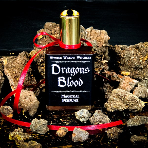 Dragon’s Blood Magickal Perfume With A Unique Eye Of The Dragon Adorned Golden Cap.