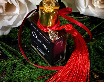 Opulence Magickal Perfume: Moldavite, Emerald, and Peridot Gem