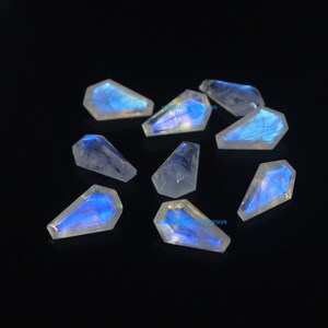 10 AAA vita regnbågsmånstenar, kistslipade 13 x 8 mm bild 3