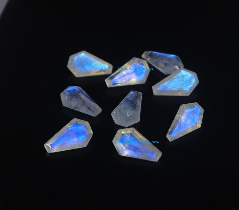 10 AAA vita regnbågsmånstenar, kistslipade 13 x 8 mm bild 3