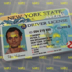 May include: A blue and white New York State driver's license with a photo of Peter Venkman, the character from the movie Ghostbusters. The license number is 084 210 950. The license is for Class D and expires on 06-16-1994.