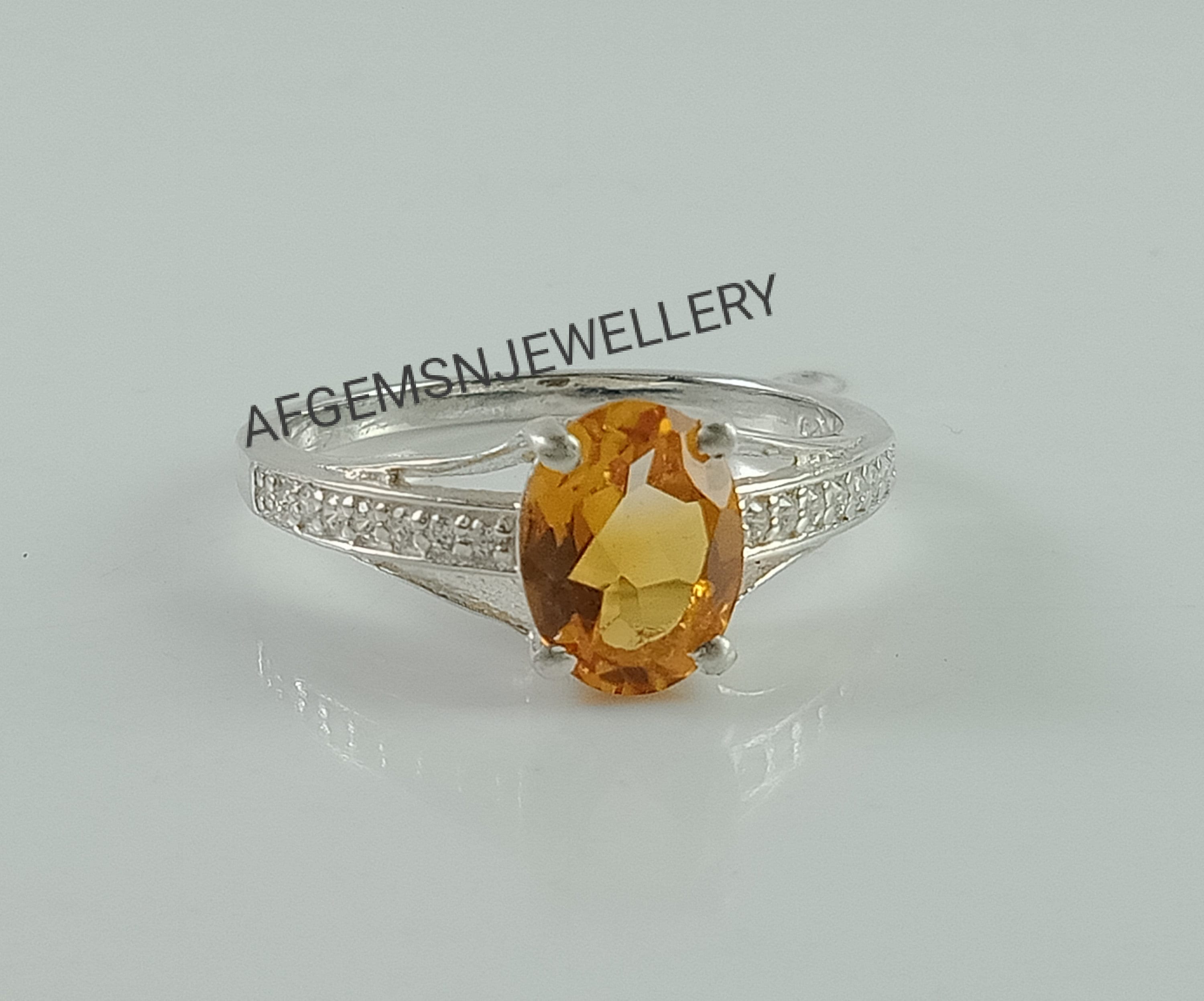 Anello topazio giallo prezzo hot sale
