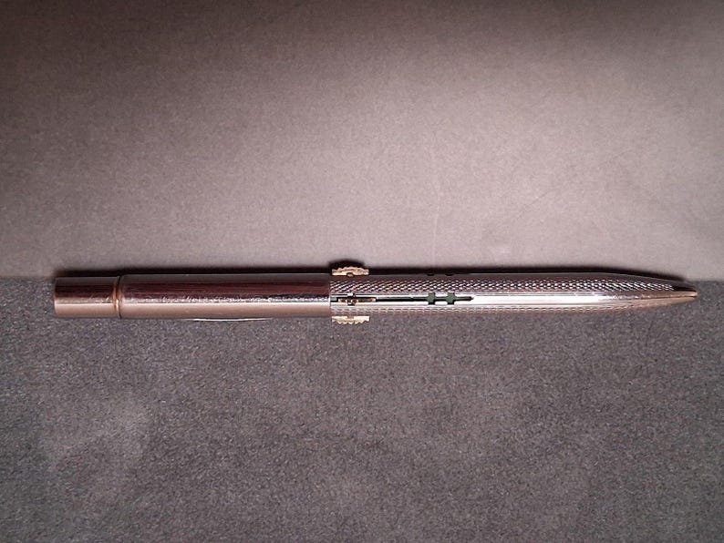 Vintage Norma 4-Color Multi Pen Ballpoint Chrome Made in USA Rotating image 3