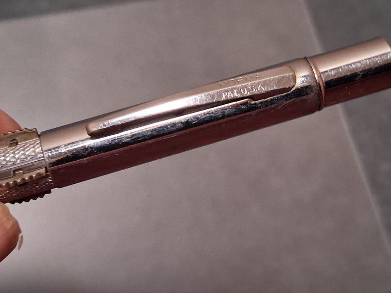 Vintage Norma 4-Color Multi Pen Ballpoint Chrome Made in USA Rotating image 7