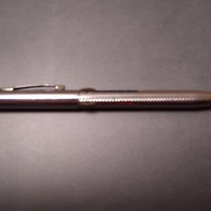 Vintage Norma 4-Color Multi Pen Ballpoint Chrome Made in USA Rotating image 2