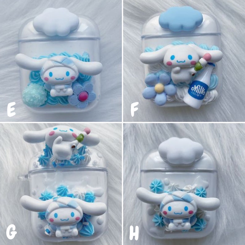 May include: Four clear plastic AirPod cases decorated with blue and white 3D embellishments. Each case features a different design with a white cloud on top, a blue flower, a white milk carton, and a white dog with blue accents.