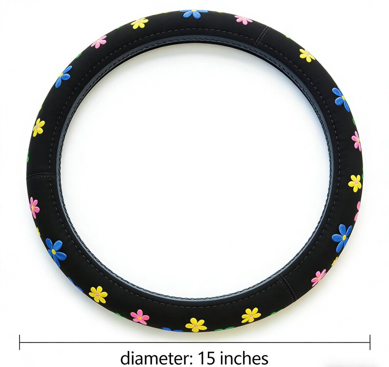May include: Black steering wheel cover decorated with multi-coloured flower designs. The cover has a diameter of 38 cm. The flowers are yellow, pink, and blue, providing a bright and cheerful look for the car's interior.