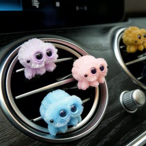 May include: A rustic wooden sign with the text "Welcome to our home" in white lettering. The sign features a distressed finish and a simple, inviting design, perfect for entryway decor.