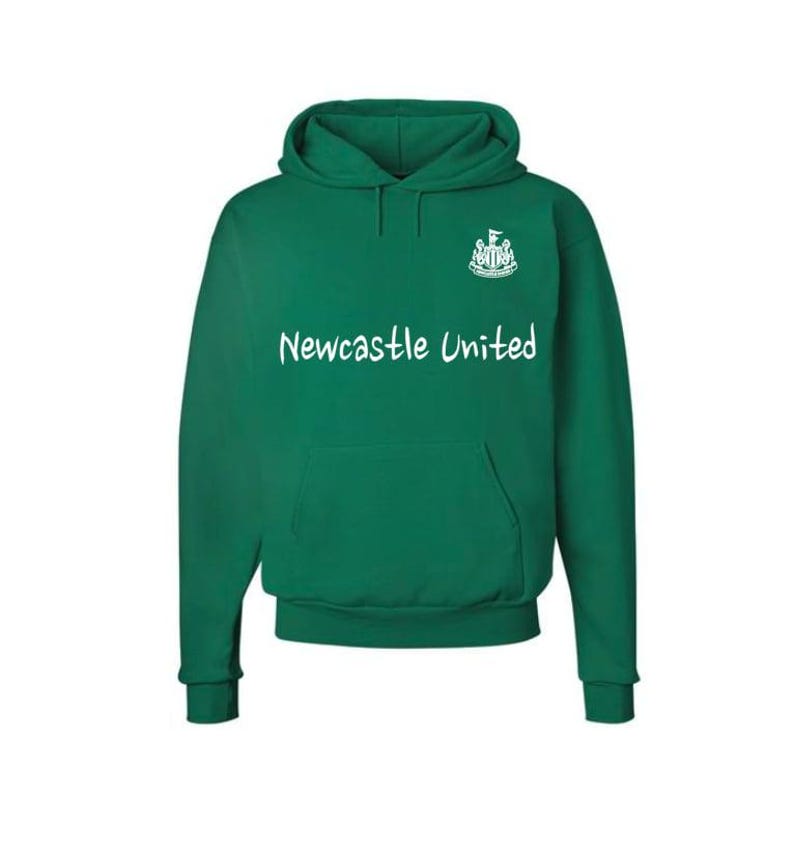May include: A green hooded sweatshirt with the text "Newcastle United" in white across the chest. The sweatshirt features a kangaroo pocket and a white emblem on the upper chest. The hoodie has a drawstring and a hood.