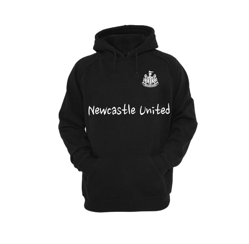 May include: Black hooded sweatshirt with the text "Newcastle United" in white across the chest. The sweatshirt features a kangaroo pocket and a white emblem on the upper left chest.