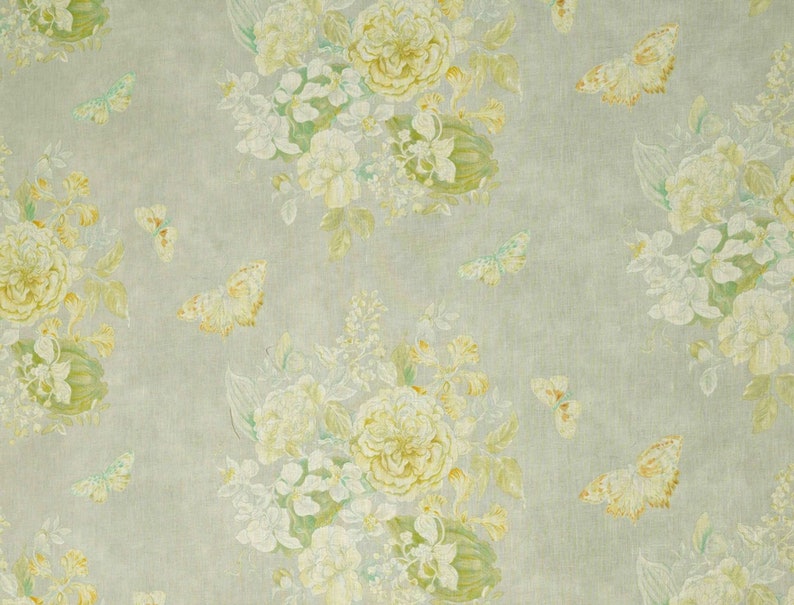 May include: A light gray background with a floral pattern featuring white and yellow flowers and green leaves.  Butterflies are scattered throughout the pattern.