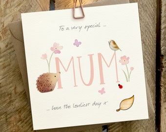 Mum card,  Birthday Card, Mother’s Day card with a hedgehog, bird and flowers. Card has a wooden leaf attachment