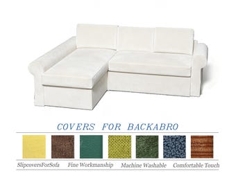 May include: A white sectional sofa with a chaise lounge. The sofa has a clean, modern design with a plush appearance. Below the sofa, the text "COVERS FOR BACKABRO" is displayed, along with fabric swatches.