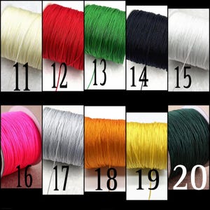 May include: Twenty spools of waxed cotton cord in various colors, including white, red, green, black, pink, silver, orange, yellow, and dark green. Each spool is labeled with a number from 11 to 20.