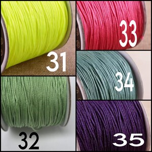 May include: A collage of five spools of nylon cord in neon yellow, hot pink, sage green, teal, and deep purple. Each spool is labeled with a white number: 31 for yellow, 33 for pink, 32 for sage, 34 for teal, and 35 for purple.