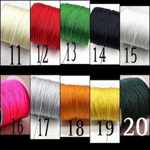 May include: Twenty spools of waxed cotton cord in various colors, including white, red, green, black, pink, silver, orange, yellow, and dark green. Each spool is labeled with a number from 11 to 20.