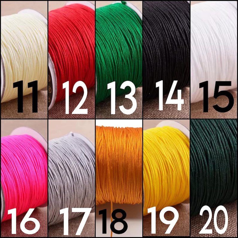 May include: A grid of ten spools of colored cord, each labeled with a number from 11 to 20. The colors include cream, red, green, black, white, hot pink, gray, orange, yellow, and dark green, all wound on individual plastic spools.