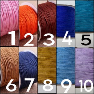 May include: A collection of ten spools of nylon cord in various colors, including pink, orange, dark brown, royal blue, teal, tan, navy blue, gold, light blue, and lavender, each labeled with a large white number from one to ten.