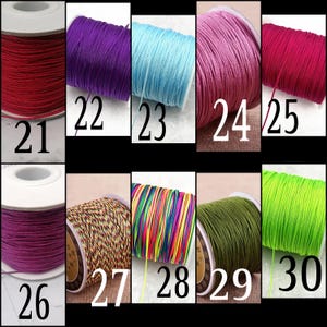 May include: Assortment of 10 spools of waxed cotton cord in various colors, including red, purple, blue, pink, green, and multi-colored. The spools are numbered 21 through 30.