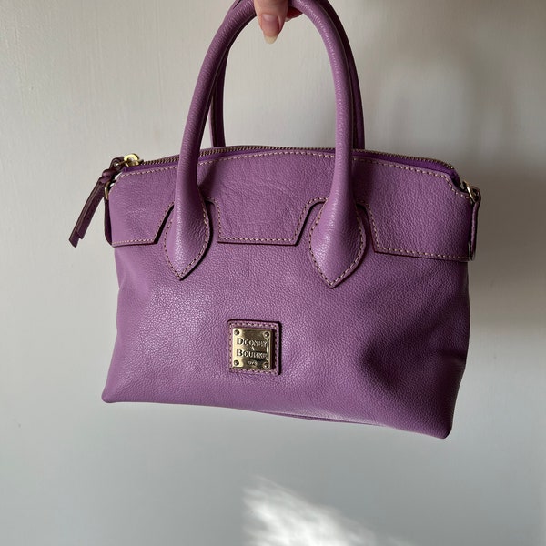 Lavender vintage top handle Dooney and Bourke leather purse with original tags and shoulder strap
