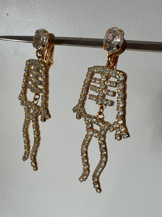 Articulated skeleton drop earrings, gold metal an… - image 3