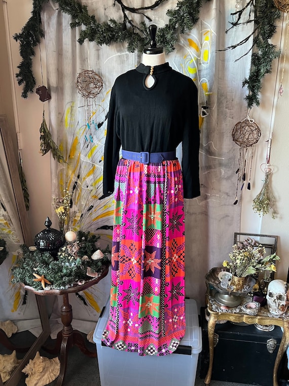 1970s floor length dress with black top and colorf