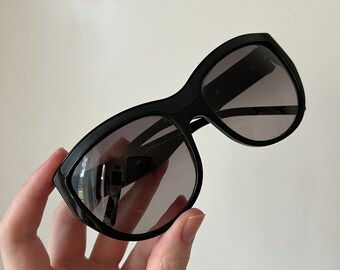 Vintage black and leather Valentino sunglasses with original red case