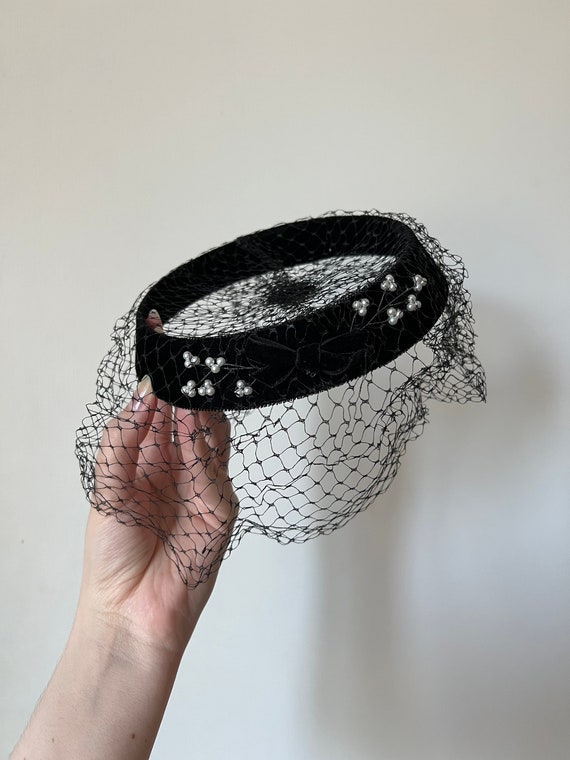 Vintage black velvet net hat with velvet bow and p